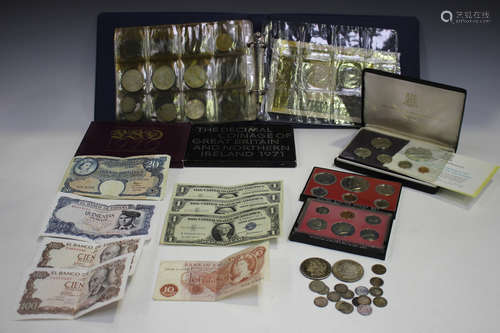 Two USA Morgan dollars, 1880 and 1890, a small quantity of silver threepences, a British Virgin