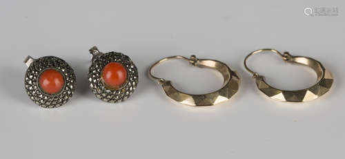 A pair of gold earrings of faceted crescent form, detailed '9ct', a pair of coral and marcasite