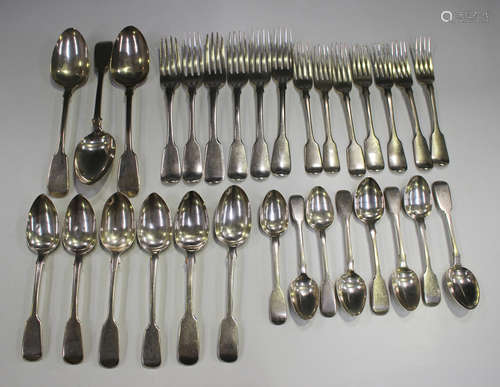 A George III and later part canteen of silver Fiddle pattern cutlery, comprising three