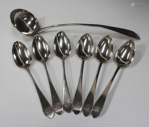 A harlequin set of six George III Scottish silver pointed Old English pattern tablespoons, three