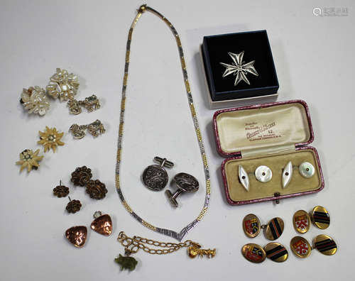 A silver and gilt two colour necklace, a pair of silver fronted cufflinks, mounted with copies of