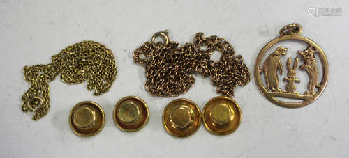 A pair of gold studs, detailed '18ct', another pair of gold studs, indistinctly detailed '9ct', a