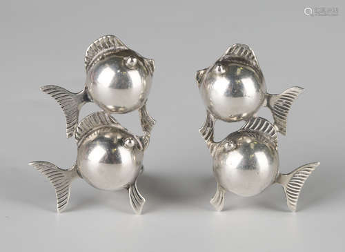 A pair of Danish .830 silver earclips, each designed as two exotic fish, by Carl Ove Frydensberg,