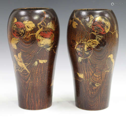 A pair of Japanese lacquered wood vases, early 20th century, each slender baluster body lacquered