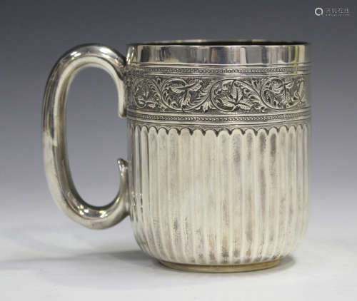 An Edwardian silver christening cup with fluting beneath a foliate band, Sheffield 1909 by James