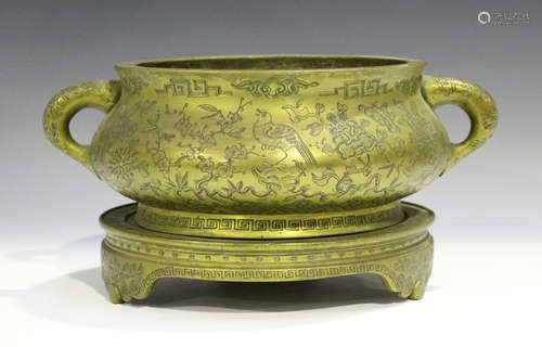 A Chinese engraved bronze bombé censer and stand, mark of Xuande but late Qing/early 20th century,