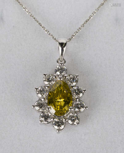 A platinum, colour enhanced dark fancy yellow diamond and diamond pendant, claw set with a pear