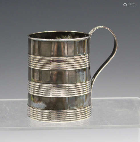 A George III silver tankard of slightly tapered cylindrical form with reeded horizontal banding