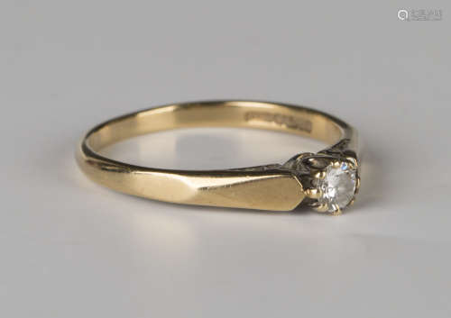 A 9ct gold and diamond single stone ring, claw set with a circular cut diamond, ring size approx