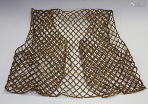 A Chinese bamboo mesh waistcoat, 20th century, constructed from short lengths of bamboo tubes,