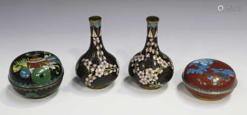 A pair of Chinese cloisonné bottle vases, early 20th century, each decorated with blossoming