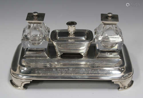 A Victorian silver inkstand, the rectangular stand with two pen depressions and engraved