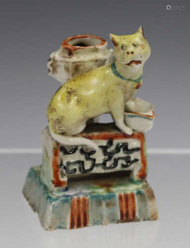 A rare Chinese enamelled blanc-de-Chine porcelain miniature cat jostick holder, Kangxi period,
