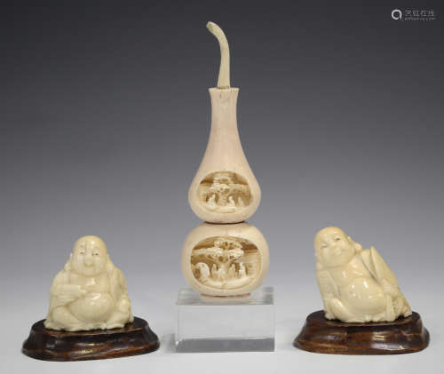 Two Japanese ivory okimono carvings, early 20th century, each modelled as a seated Hotei, incised