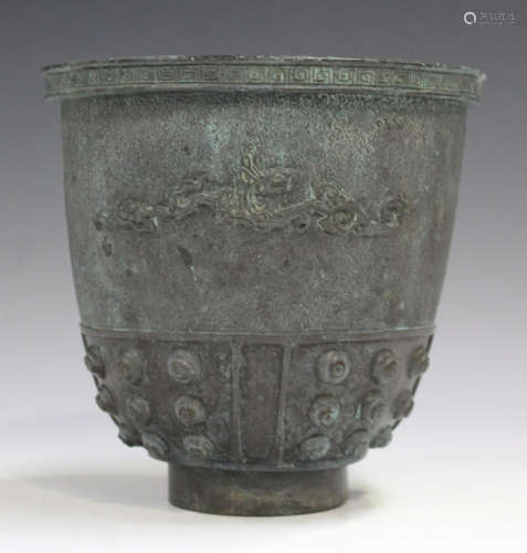 A Chinese archaistic green patinated bronze pot, 20th century, the U-shaped body with keyfret rim,