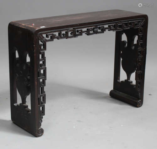 A Chinese hardwood altar table, possibly zitan, late Qing dynasty, the rectangular top above a