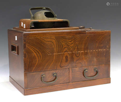 A Japanese elm rectangular hibachi, early 20th century, fitted with two drawers and compartments,
