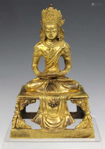 A Sino-Tibetan gilt bronze figure of Amitayus, mark of Qianlong but probably 19th century,