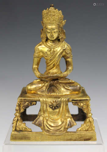 A Sino-Tibetan gilt bronze figure of Amitayus, mark of Qianlong but probably 19th century,