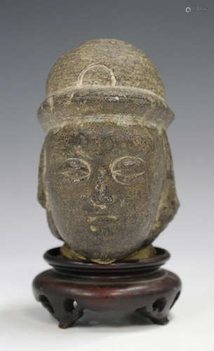 A South-east Asian carved stone Buddha head fragment, probably Vietnamese, possibly 17th century,