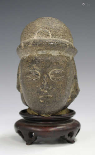 A South-east Asian carved stone Buddha head fragment, probably Vietnamese, possibly 17th century,