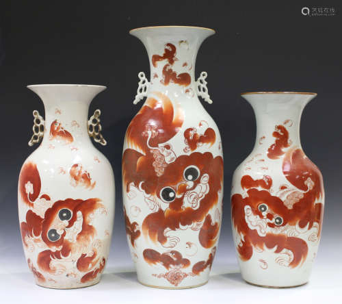 A Chinese iron red decorated porcelain vase, 20th century, of baluster form, painted with a