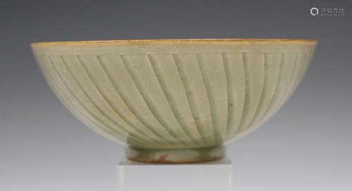 A Chinese Longquan celadon glazed bowl, Song style but probably 20th century, of hemispherical form,