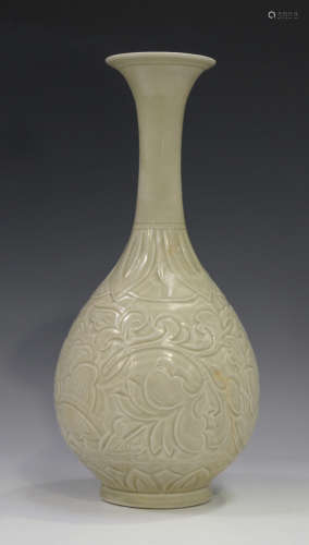 A Chinese pale celadon glazed bottle vase, Song style but probably 20th century, the ovoid body
