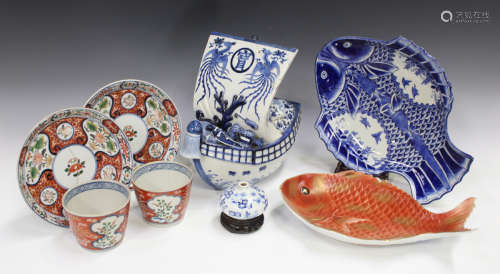 A small collection of Japanese porcelain, Meiji period and later, including a pair of Imari