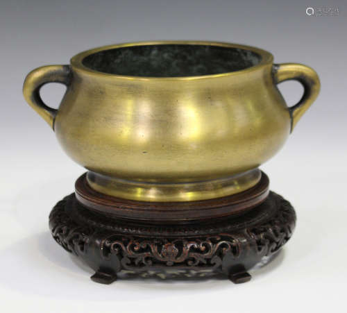 A Chinese polished bronze bombé censer, mark of Xuande but probably late Qing dynasty, the