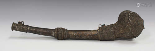 A Tibetan silvered copper kangling (trumpet), probably early 20th century, with embossed decoration,