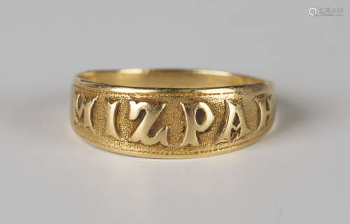 A gold ring, circa 1900, detailed 'Mizpah', marked '18c', ring size approx O.Buyer’s Premium 29.