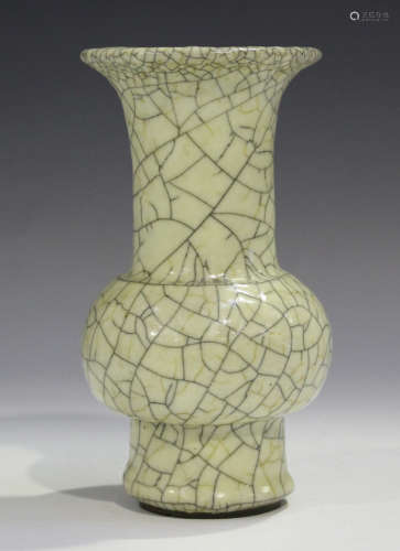 A Chinese Guan-type crackle glazed stoneware vase, the globular body and flared neck covered in a