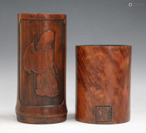 A Chinese hardwood cylindrical brushpot, probably Qing dynasty, carved in low relief with seal