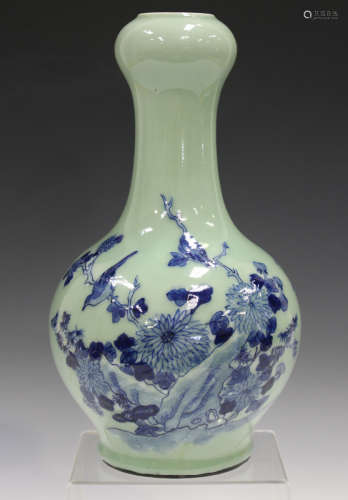 A Chinese blue and white celadon ground porcelain bottle vase, early 20th century, the onion mouth