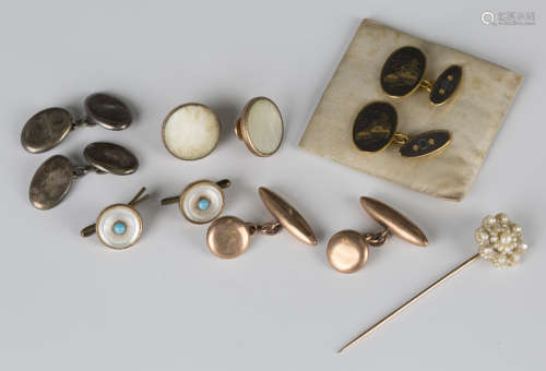 A pair of 9ct gold cufflinks with circular fronts and torpedo shaped backs, a pair of Victorian