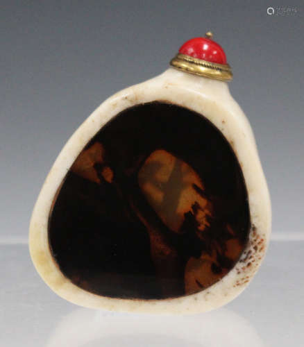 A Chinese bone and tortoiseshell snuff bottle, late 19th/early 20th century, of irregular