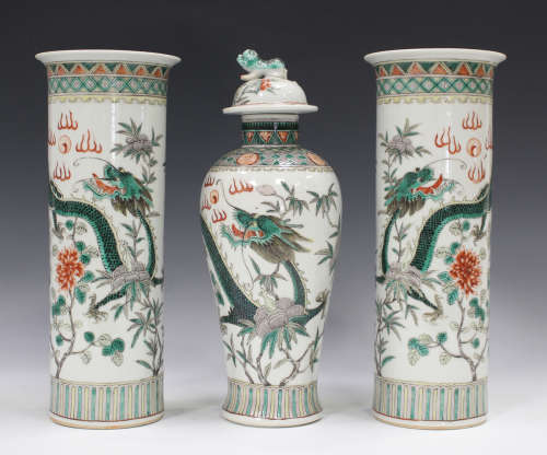 A Chinese famille verte porcelain garniture of three vases, mark of Kangxi but late 19th century,