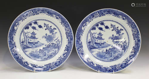 Two Chinese blue and white export style porcelain plates, Qianlong style but 20th century, painted