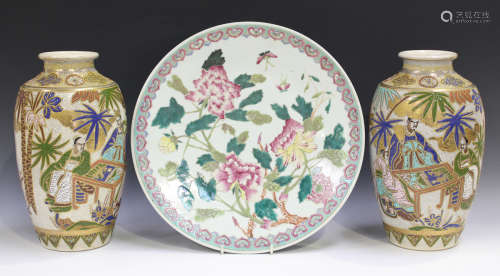 A Chinese famille rose porcelain circular dish, late 19th/early 20th century, painted with peonies