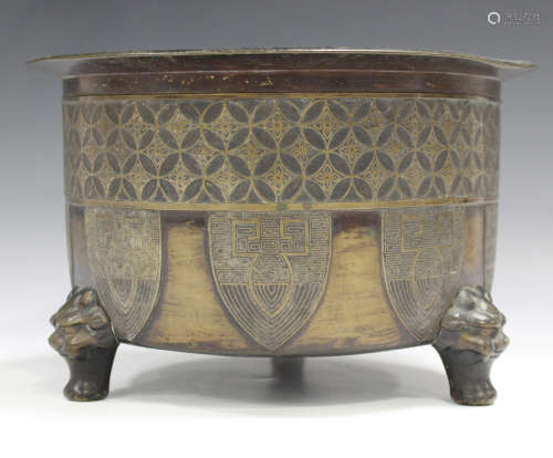 A Chinese bronze circular cylindrical censer, 20th century, the sides cast with cash diaper band