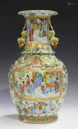 A Chinese Canton famille rose porcelain vase, mid-19th century, the ovoid body and flared neck