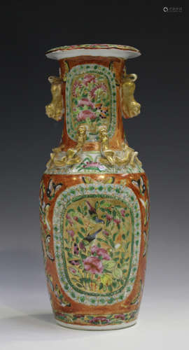 A Chinese Canton famille rose porcelain vase, mid-19th century, painted with gilt ground panels of