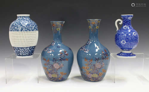 Two Japanese Koransha porcelain vases, Meiji period, each ovoid body and trumpet neck painted in