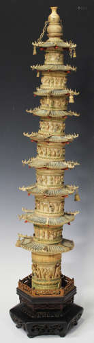 A Chinese carved and stained ivory model of a nine-storey pagoda, late Qing dynasty, each level