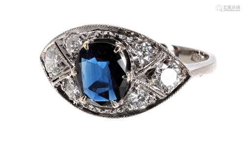 18ct white gold sapphire and diamond ring in the Art Deco manner, the central oval sapphire 1.10ct