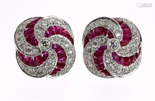 Good pair of 18ct white gold ruby and diamond cluster earrings of swirl design, post backs with