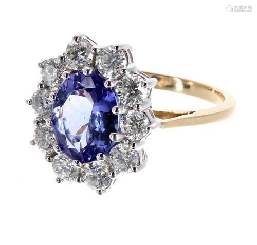 Good large 18ct tanzanite and diamond oval cluster ring, the tanzanite 2.46ct approx, in a