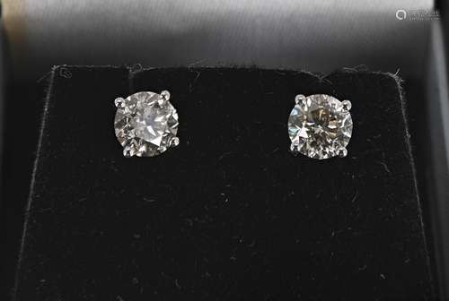 Pair 18ct white gold round brilliant diamond ear studs, estimated 1.41ct, approx, clarity SI, colour