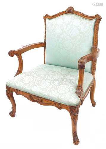 19th century French fauteuil (armchair), the carved frame surmounted with a shell moulding over